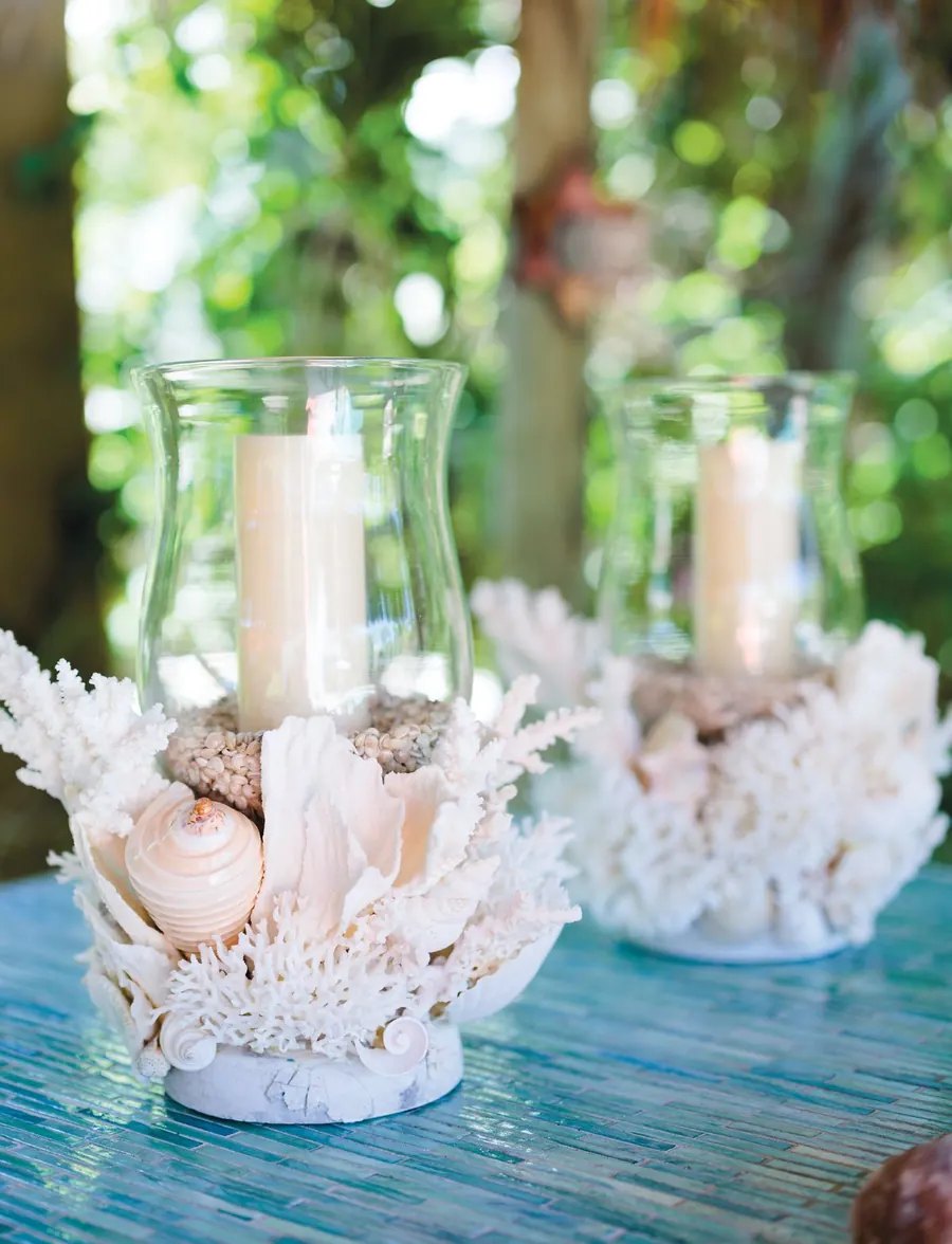 Seashell candleholders on a table